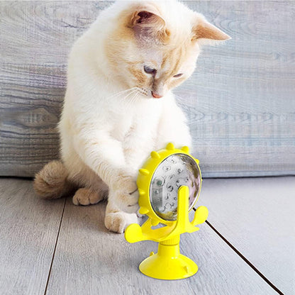 distributeur de croquettes pour chat roulette jouet jaune avec chat