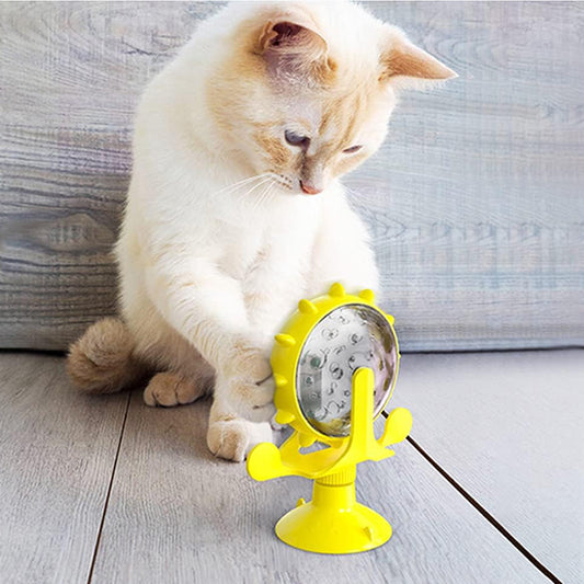distributeur de croquettes pour chat roulette jouet jaune avec chat